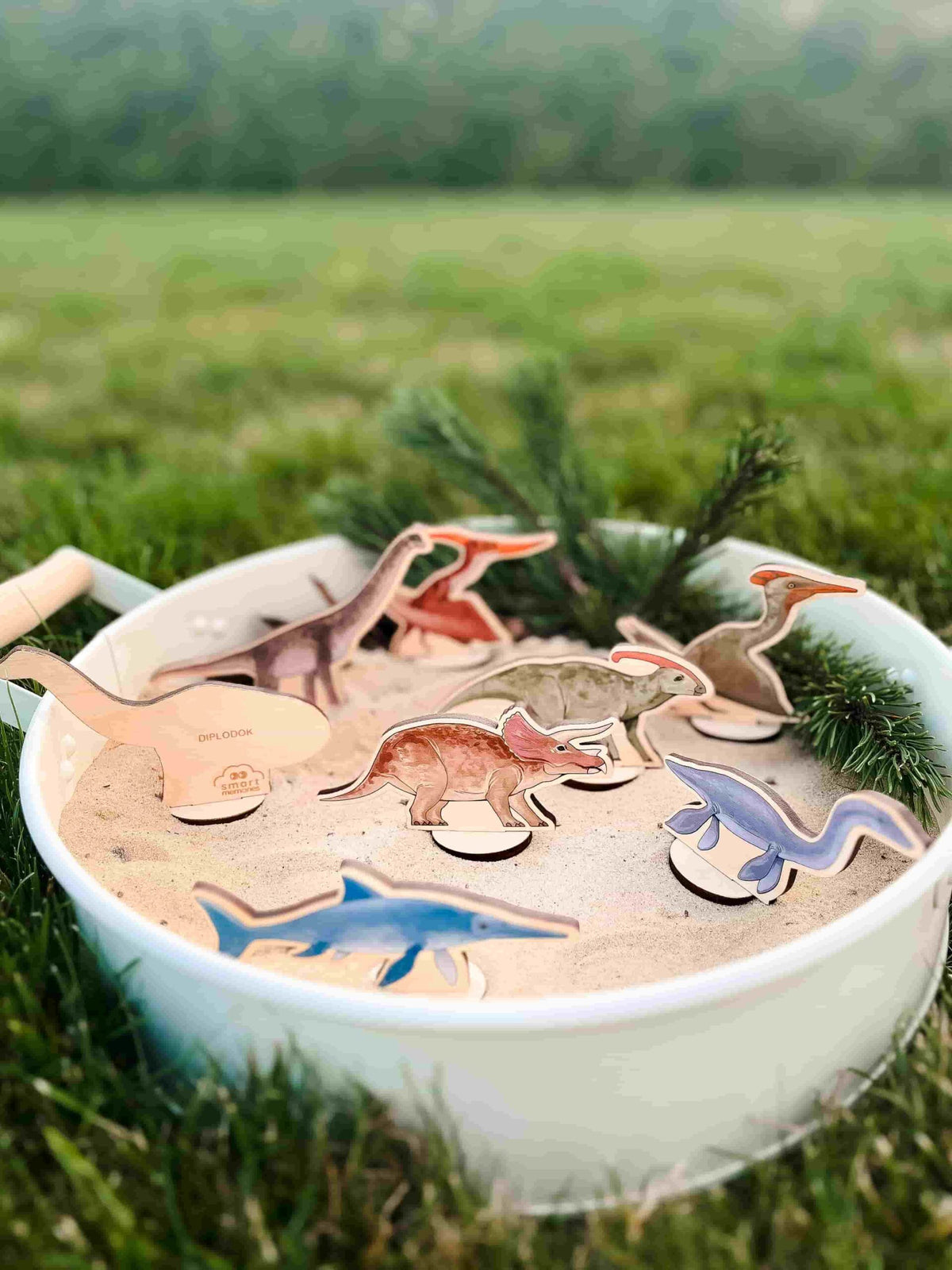 Wooden dinosaur figures