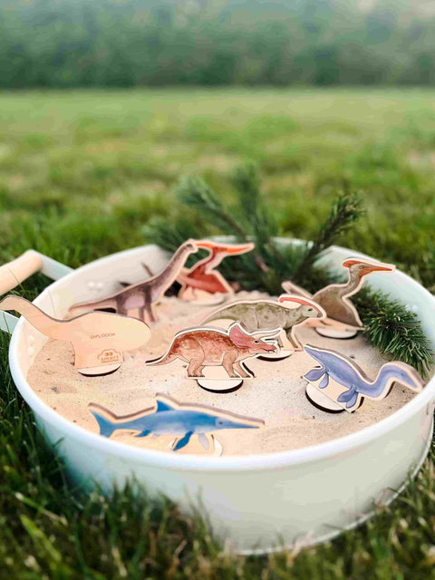 Wooden dinosaur figures
